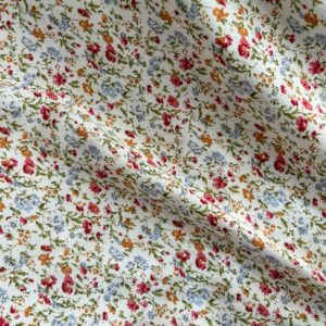 Tissu popeline de viscose fleurs fond blanc cassé